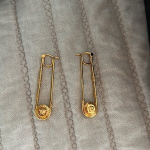 Versace elongated Medusa earrings
